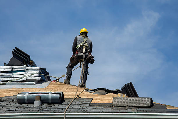 Professional Roof Replacement technician working in Jamaica, VT
